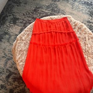 Tory Burch pleated skirt.  Size 2. Good condition. Does have 2 pen/ink marks.